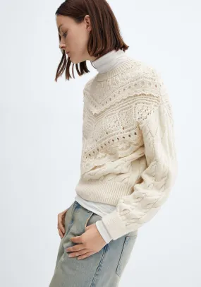 Knitted sweater with openwork details