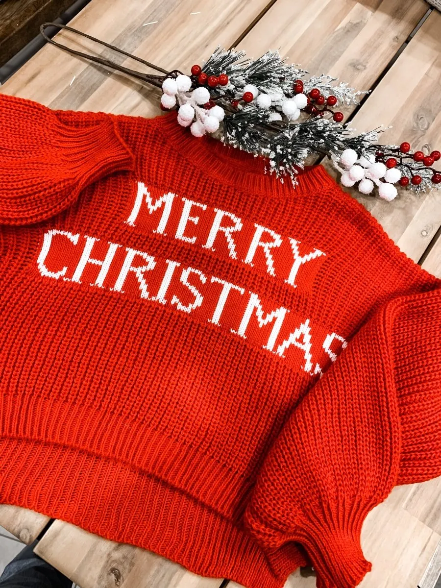 Maglione natalizio corto rosso con scritta Merry Christmas